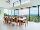 Spacious dining area with large windows and scenic views