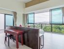 Modern bedroom with large windows and a scenic view