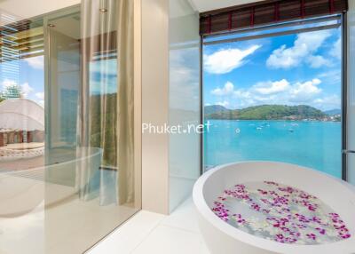 Luxurious bathroom with panoramic seaside view