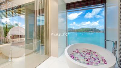 Luxurious bathroom with panoramic seaside view