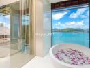 Luxurious bathroom with panoramic seaside view