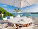 Outdoor dining area with panoramic sea view