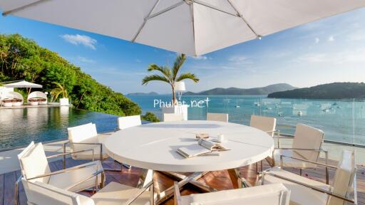 Outdoor dining area with panoramic sea view