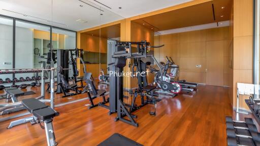 Modern indoor gym with various exercise equipment