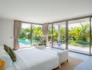 Spacious bedroom with floor-to-ceiling windows and pool view