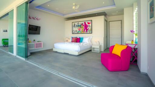 Modern and vibrant bedroom with balcony