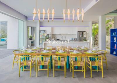 Vibrant modern dining room with large table and chairs
