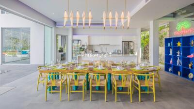 Vibrant modern dining room with large table and chairs