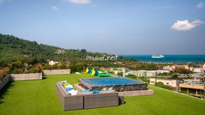 Rooftop with seating area and scenic view