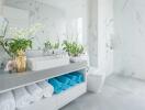 Modern bathroom with marble walls and plants