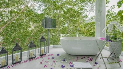 Scenic Bathroom with Bathtub and Decorative Lanterns