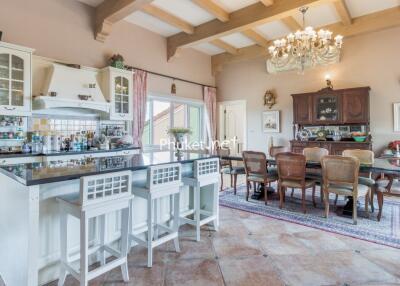 Spacious kitchen and dining area with classic decor