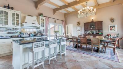 Spacious kitchen and dining area with classic decor