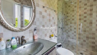 Modern bathroom with glass shower and sink