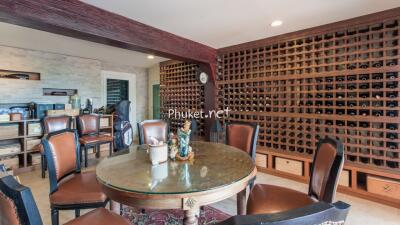 A wine cellar with a small dining table