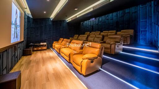 Luxurious home theater with comfortable recliner seats and ambient lighting