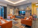 Modern living room with orange leather sofas, wall-mounted TV and decorative shelving