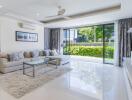 Modern living room with large windows and contemporary decor