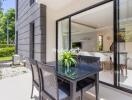 Outdoor patio area with a view into the living room