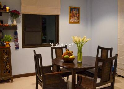 Dining area with wooden furniture and decor