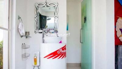 Modern white bathroom with creative decor