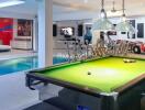 Recreation area with pool table and swimming pool