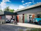 Modern house with garage and vintage vehicles