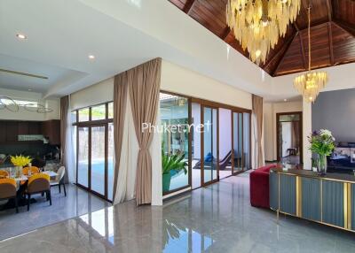 Spacious and elegant main living area with dining and kitchen