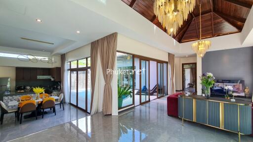 Spacious and elegant main living area with dining and kitchen