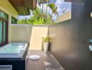 Modern outdoor bathroom with jacuzzi and shower