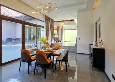 Modern dining room with large windows