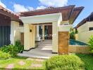 Front view of a house with greenery