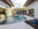 Modern outdoor area with pool and lounge chairs