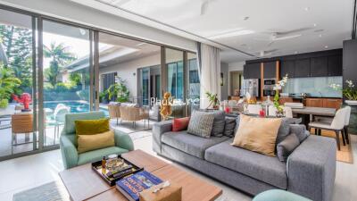 Modern living room with pool view