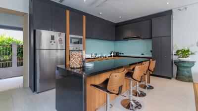 Modern kitchen with island and bar stools