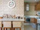 Modern kitchen with counter and bar stools