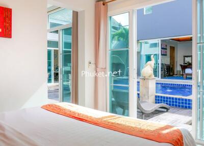 Bedroom with pool view