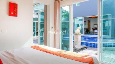 Bedroom with pool view