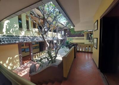 Outdoor corridor with courtyard view