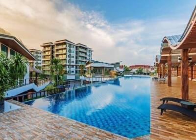 Outdoor swimming pool with surrounding buildings