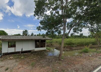 Small house next to a pond