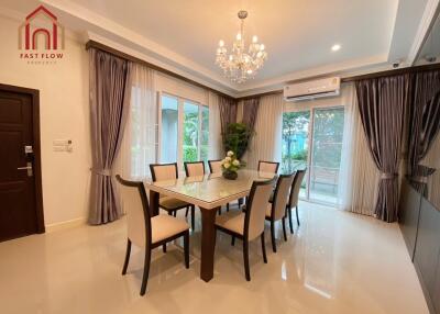 Spacious and elegant dining room with large windows