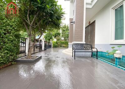 Outdoor Patio with Bench and Garden