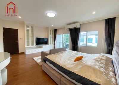 Spacious Bedroom with modern decor and large windows