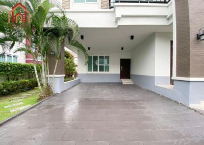 Front view of a modern house with driveway