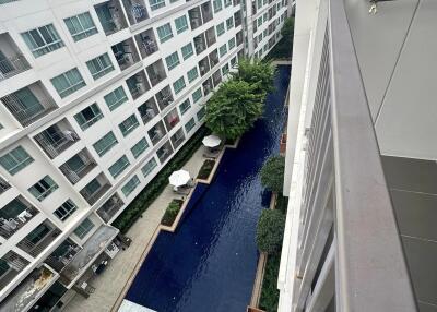 Aerial view of residential building with swimming pool