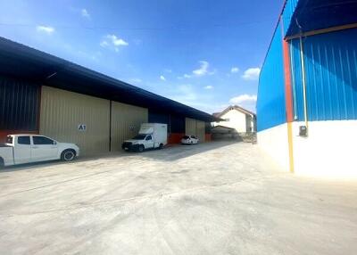 Warehouse exterior with parking area