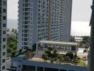 View of tall residential buildings with outdoor communal area