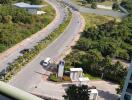 View from balcony with surrounding area and road