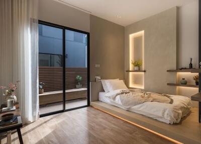 Cozy modern bedroom with built-in shelves and sliding glass door